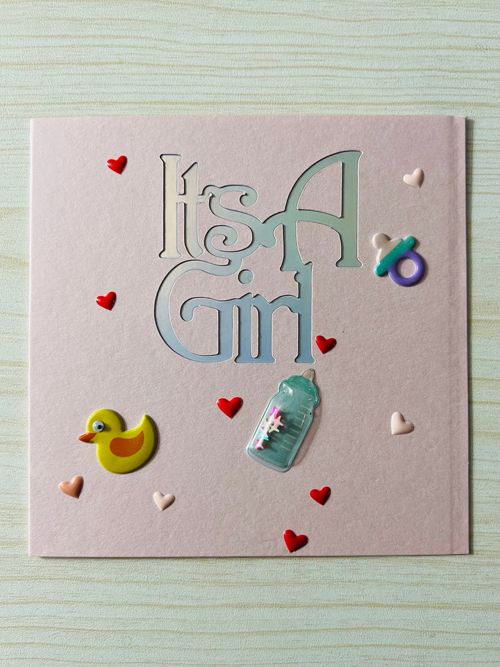 It's a Girl Greeting Card: Rubber Ducky, Baby Bottle Accents