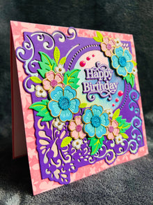 Happy Birthday Card with Pink and Blue Floral Arrangement - A Blossoming Wish for a Joyful Year