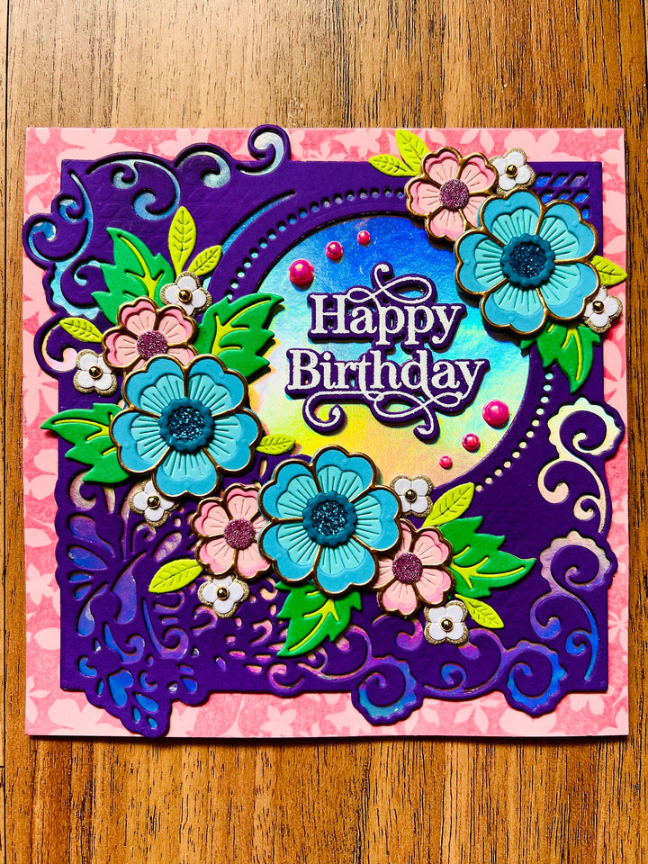 Happy Birthday Card with Pink and Blue Floral Arrangement - A Blossoming Wish for a Joyful Year