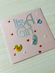 It's a Girl Greeting Card: Rubber Ducky, Baby Bottle Accents