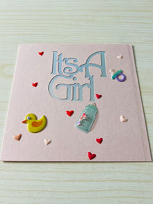 It's a Girl Greeting Card: Rubber Ducky, Baby Bottle Accents