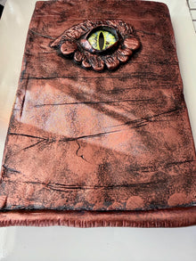 Handmade decorative Dragon Eye on a hardcover journal measuring 8.25"x5.5"x1"