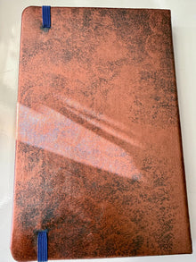 Handmade decorative Dragon Eye on a hardcover journal measuring 8.25"x5.5"x1"
