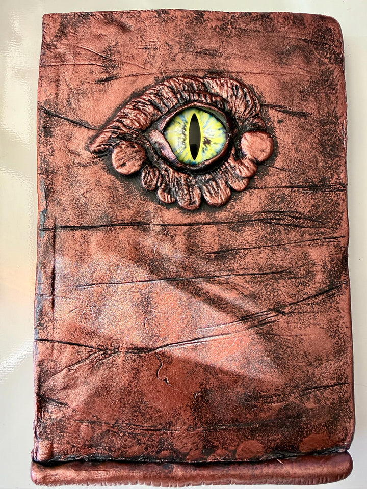 Handmade decorative Dragon Eye on a hardcover journal measuring 8.25"x5.5"x1"