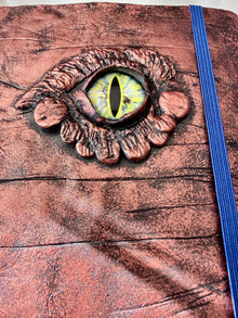 Handmade decorative Dragon Eye on a hardcover journal measuring 8.25"x5.5"x1"