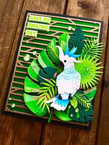 Blue Cockatoo with Leaves Have an Amazing Day Card