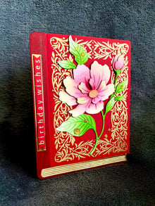Red Book with Pink Magnolia Stem Birthday Wishes Card