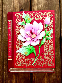 Red Book with Pink Magnolia Stem Birthday Wishes Card