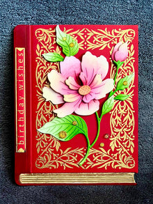 Red Book with Pink Magnolia Stem Birthday Wishes Card