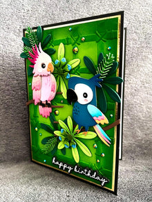 Pink Cockatoo with Blue Parrot and Bamboo Background Happy Birthday Card