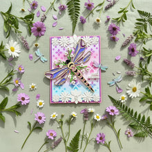 Floral Dragonfly card flat lay on sage green linen with dried wildflowers and dragonfly charms