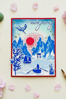 Asian Journey card flat lay on cream rice paper with jade stone and bamboo brush