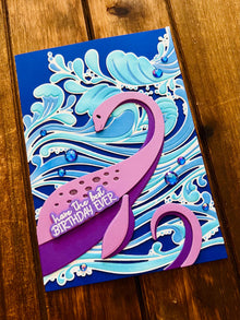 Purple Lochness Monster and Ocean Waves Birthday Card